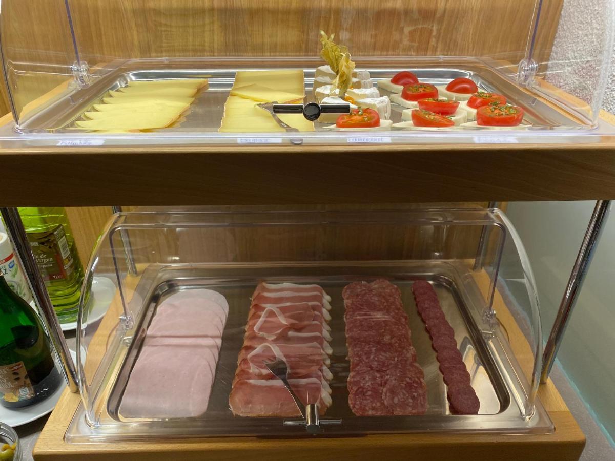 Hotel Garni Enzian ดามุลส์ ภายนอก รูปภาพ