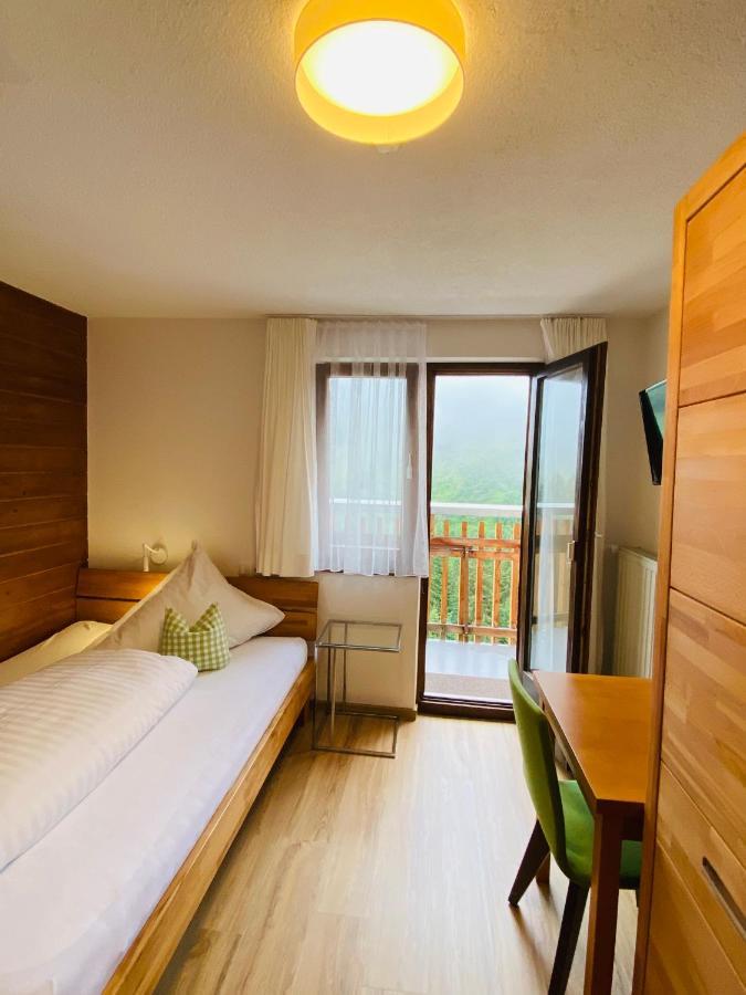 Hotel Garni Enzian ดามุลส์ ภายนอก รูปภาพ