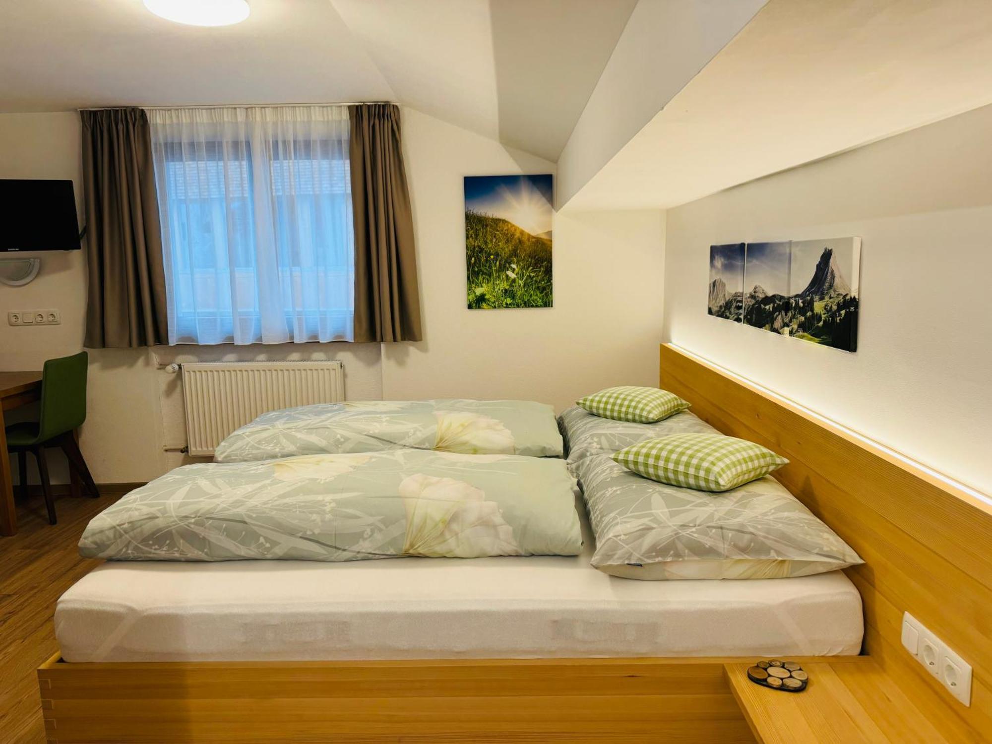 Hotel Garni Enzian ดามุลส์ ภายนอก รูปภาพ